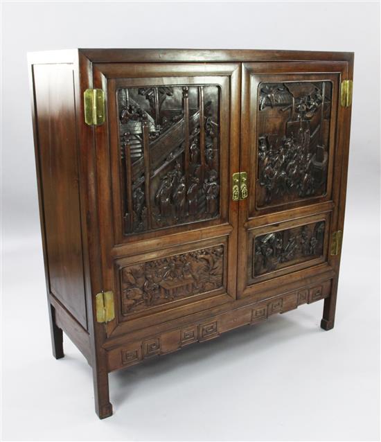 An early 20th century Chinese hongmu cabinet, W.3ft 9in. D.1ft 7in. H.3ft 11in.